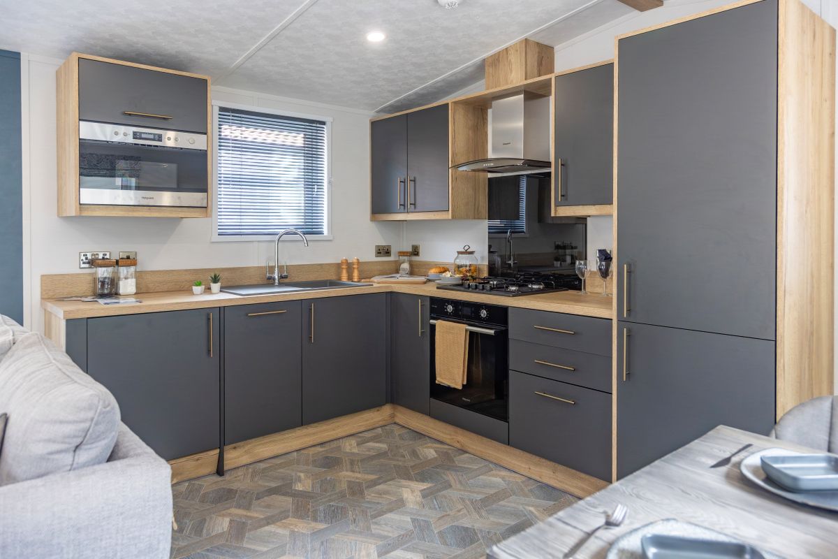 Holiday lodge kitchen at Overstone Lakes Holiday Park
