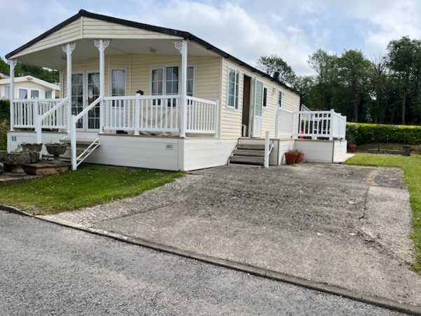 Holiday lodge exterior at Llanrhidian Holiday Park